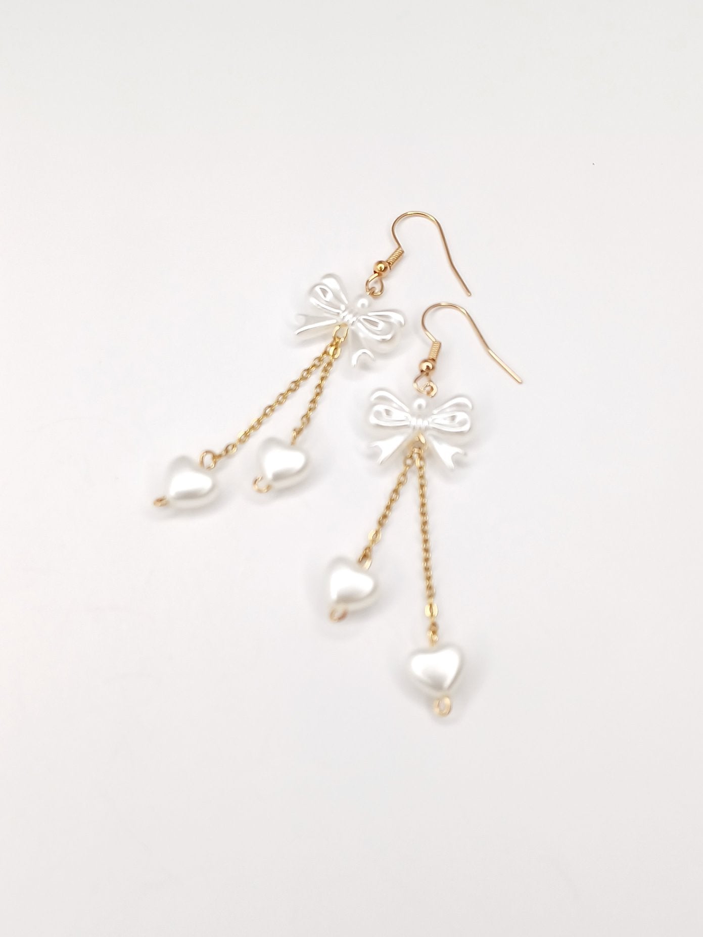 bow dangle earrings
